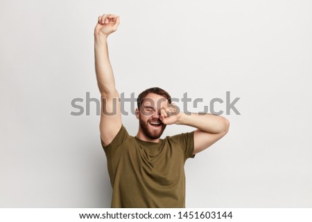 sleepy man yawning and stretching, isolated on a white background. monday, cheerful guy having good mood in the morning