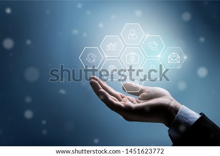 Hand holding plus sign virtual means to offer positive thing (like benefits, personal development, social network, health insurance) with copy space
    
    - Image Royalty-Free Stock Photo #1451623772