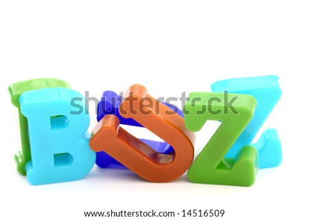 Close-up of letters. "Buzz" word.