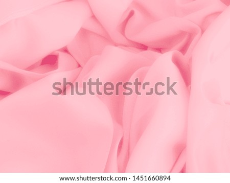 Blurred softness sweet pink pastel color tone cloth curve background.