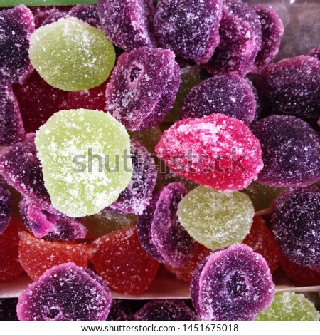 Macro photo of food jelly candy. Texture background multicolored dessert fruit jelly candies. Image of food jelly candy marmelade