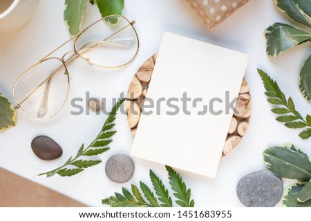 eco mockup with card, wood and leaves