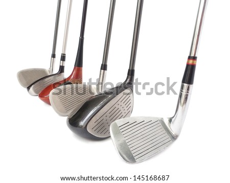 different golf clubs on white background.