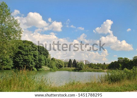 River in Russia, park, pond, lake, greenery in the park. Royalty-Free Stock Photo #1451788295
