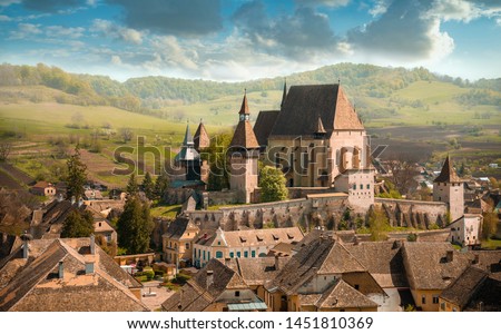 summer morning view of the cityscape of Biertan town Fortified Church, Transylvania, Romania, Europe Royalty-Free Stock Photo #1451810369