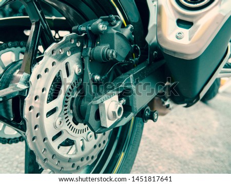 Brake caliper of a modern sports motorcycle. Conceptual layout for the design of the sign service.