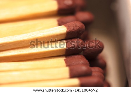 Box of open matches, matches being arranged in the same box. Small box full of wooden matches. No fire on. Royalty-Free Stock Photo #1451884592