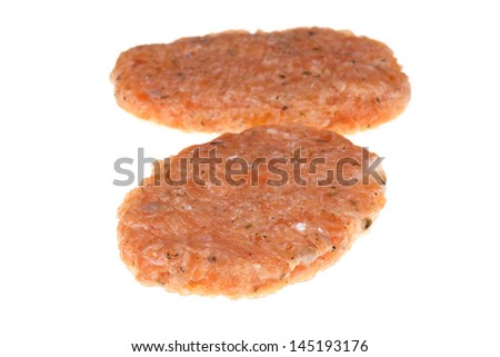 Two salmon hamburgers with white background