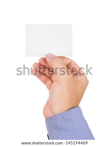 Hand holding a paper business card isolated on white background