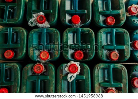 Gallons of oil concept for gallons of oil that are smuggled in border of Thailand Royalty-Free Stock Photo #1451958968