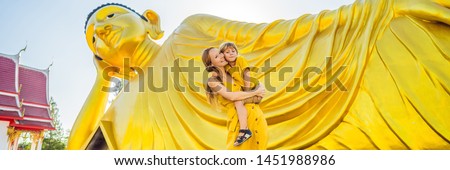 Happy tourists mother and son on background ofLying Buddha statue BANNER, LONG FORMAT