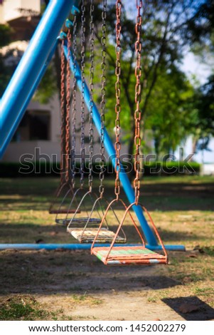 Flexible swing with wooden seat is one of the popular outdoor playground equipment.