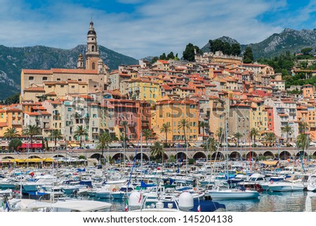 Colourful Menton harbour and town on the Cote d'Azur Royalty-Free Stock Photo #145204138