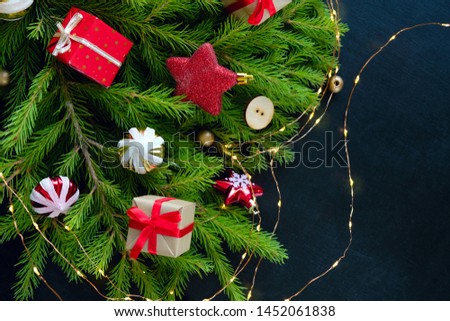 Decorated Christmas tree on black background. Christmas card