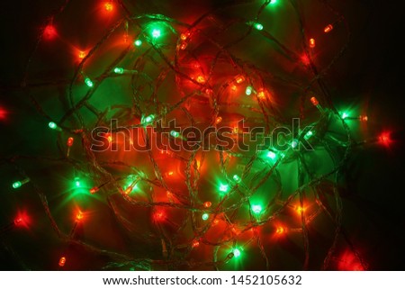 Christmas multicolor lights. Electric lights. Decorative garland