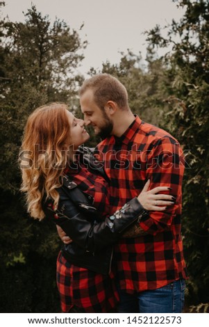 Happy loving couple outdoor in park - Image 