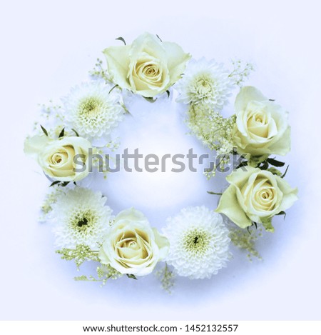 White flowers on white background. Wedding flowers. Flower arrangement. Pastel color. The view from the top. Background for greetings, wedding invitations, women's day and other holidays.