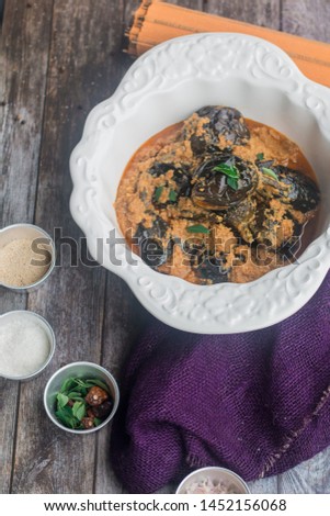 Stock photo of Spicy Bengun/Eggplant Curry.Baghaar-e-baingan is a popular Indian cuisine brinjal curry of Hyderabad. It is also used as a side dish with the Hyderabadi biryani