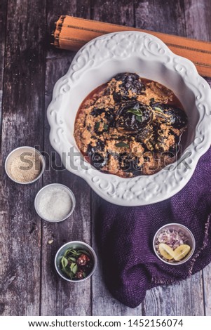 Stock photo of Spicy Bengun/Eggplant Curry.Baghaar-e-baingan is a popular Indian cuisine brinjal curry of Hyderabad. It is also used as a side dish with the Hyderabadi biryani