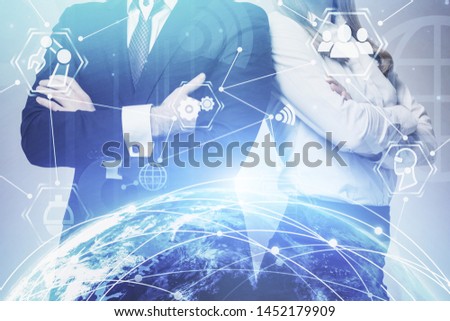 Confident business people standing together with double exposure of planet hologram and internet icons. Concept of hi tech. Toned image. Elements of this image furnished by NASA