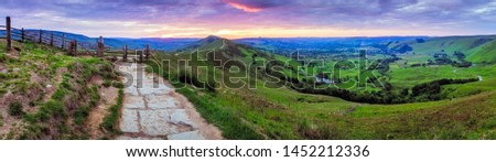 Panorama of Mam Tor in Peak District National Park in Uk at sunset. Royalty-Free Stock Photo #1452212336