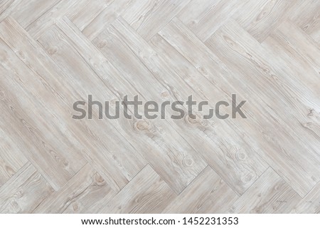 top view of empty brown wooden herringbone floor background texture. Royalty-Free Stock Photo #1452231353