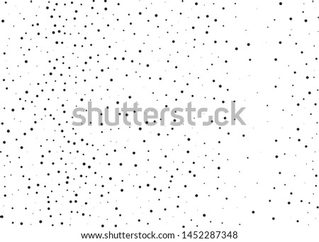 Grainy grunge abstract texture on a white background. Vector splatter of calligraphy ink in black on white background. Black ink blow explosion on white background. Paint spray, drop. Vector. 