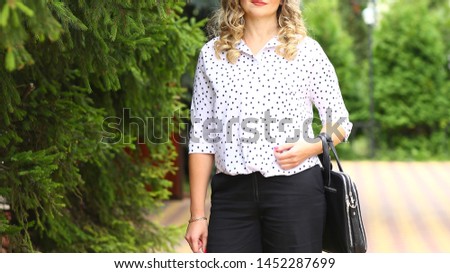 stylish business woman outdoors in summer