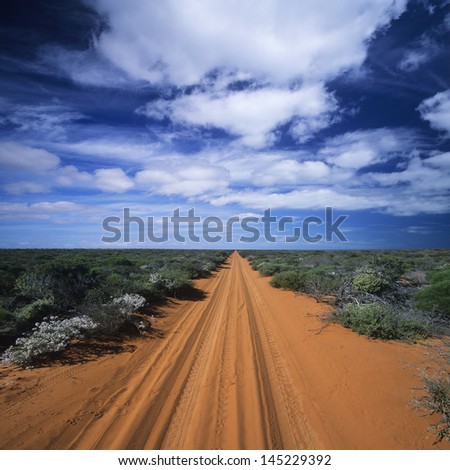 Rural Road in Vast Landscape