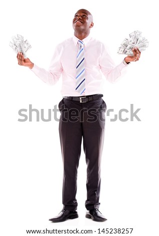 Successful business man holding dollar bills - isolated over white