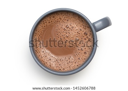 Hot chocolate in a blue-grey ceramic mug isolated on white from above.