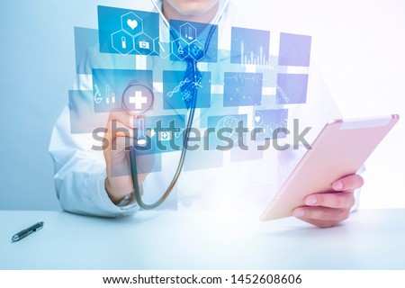Close up of Doctor is showing medical analytics data, Medical technology concept