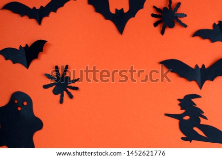 Halloween holiday concept with paper black bats, spider and ghosts