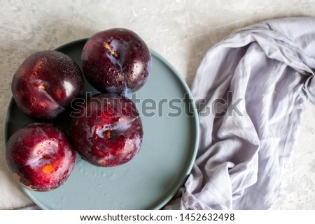 Ripe, juicy plums
Ripe, juicy plums. Washed plums cut with a knife.Vegetarian food.

