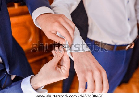 groom helped arrange the shirt