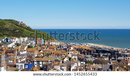 Hastings town landscape in England, southeast coast. View over Hastings old town to the sea from the hill. Royalty-Free Stock Photo #1452655433