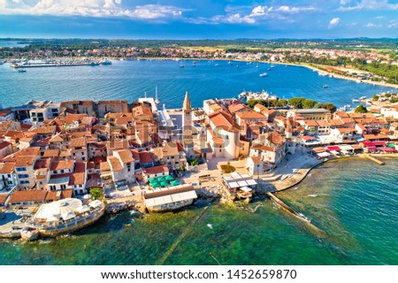 Town of Umag historic coastline architecture aerial view, archipelago of Istria region, Croatia Royalty-Free Stock Photo #1452659870