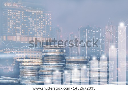 Double exposure of city and rows of coins for money, finance and business concept of teamwork and partnership. ECN Digital economy, best, money, passive income.