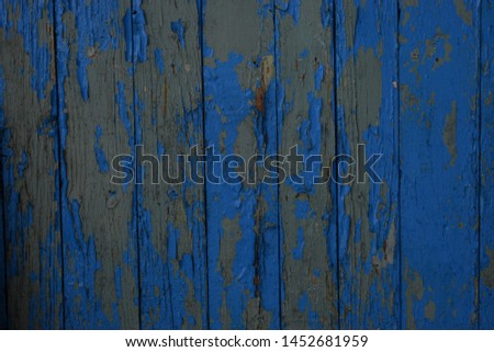 Background of three wooden boards with knots. Brushed boards with nails and knots of natural color. Textured wooden wall.