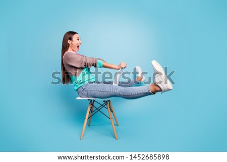 FUll size photo of excited rejoicing creative ecstatic lady imaging she is ridding a horse isolated bright background Royalty-Free Stock Photo #1452685898