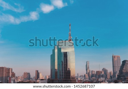 Cityscape Business District in vintage tone, high speed internet tower, head office, Panorama View with Height Building in Afternoon.