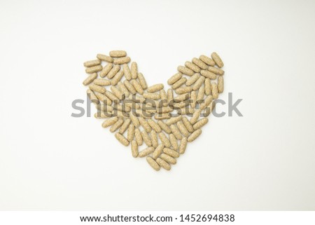 Supplementary tablets place on a white background.