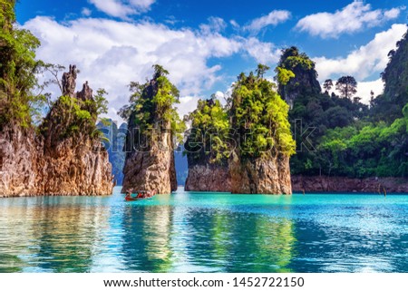 Beautiful mountains in Ratchaprapha Dam at Khao Sok National Park, Surat Thani Province, Thailand. Royalty-Free Stock Photo #1452722150