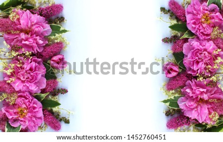 Bright pink flowers on white background. Festive floral arrangement. Background for greetings, invitations, cards.