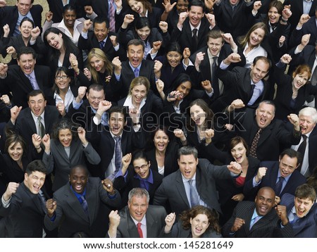 Elevated view of large group of multiethnic business people cheering Royalty-Free Stock Photo #145281649