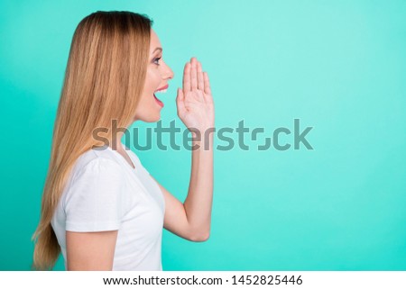 Profile side photo of cute person shouting wondering advertising wearing white t-shirt isolated over teal turquoise background