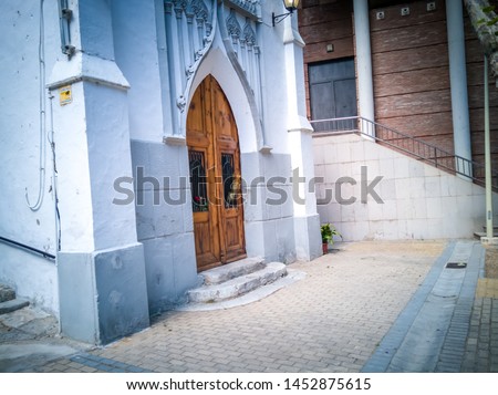 The San Luis church next to the Municipal Auditorium in the mountains of Bunyol or Bunol a town located in Valencia, Spain and internationally known for hosting the Tomatina festival.