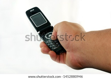 man hand holding black cellphone on white backgrounds