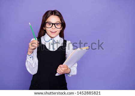 Portrait of her she nice attractive lovely cheerful cheery brainy genius diligent pre-teen girl nerd doing class home work task solution science isolated over bright vivid shine violet background Royalty-Free Stock Photo #1452885821