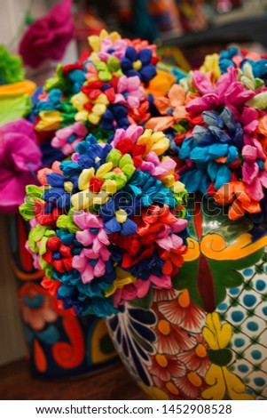 A bouquet of paper flowers. Colorful, Spanish flowers.                              